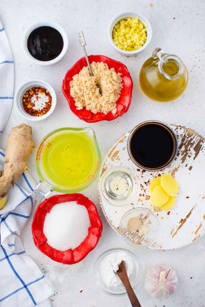 overhead shot of general tso sauce ingredients in bowls on a table